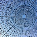 The intricate wrought iron lattice work atop the Temple of Love.