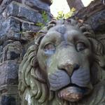 A large lion sculpture inside the lower gates.